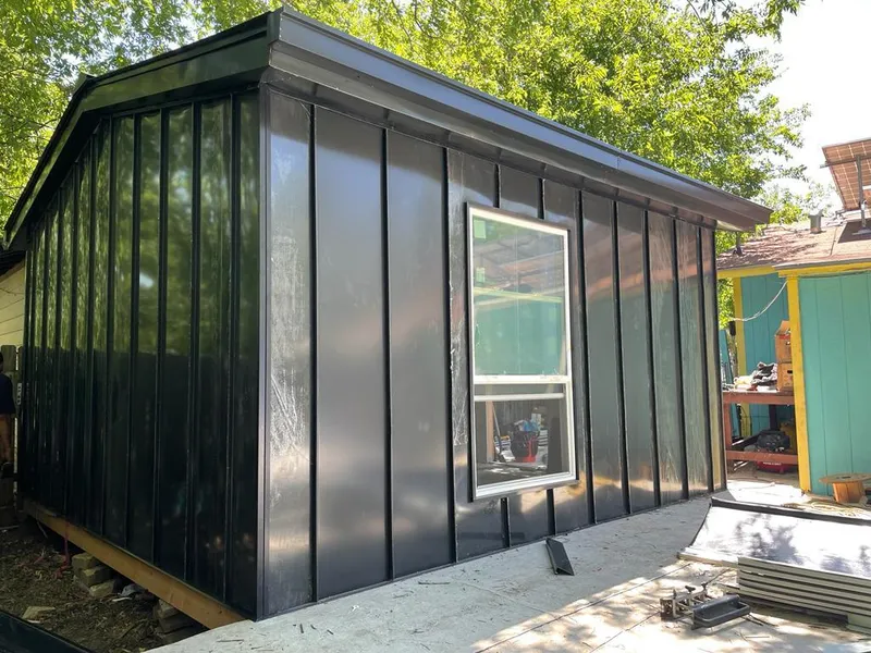 Black standing seam metal wall panels for Metal Roof Installation in Argyle